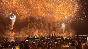 Open-air party in Cannes with people dancing under the stars on the French Riviera