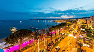 Sunset aperitif on a Cannes terrace with cocktails and Mediterranean view