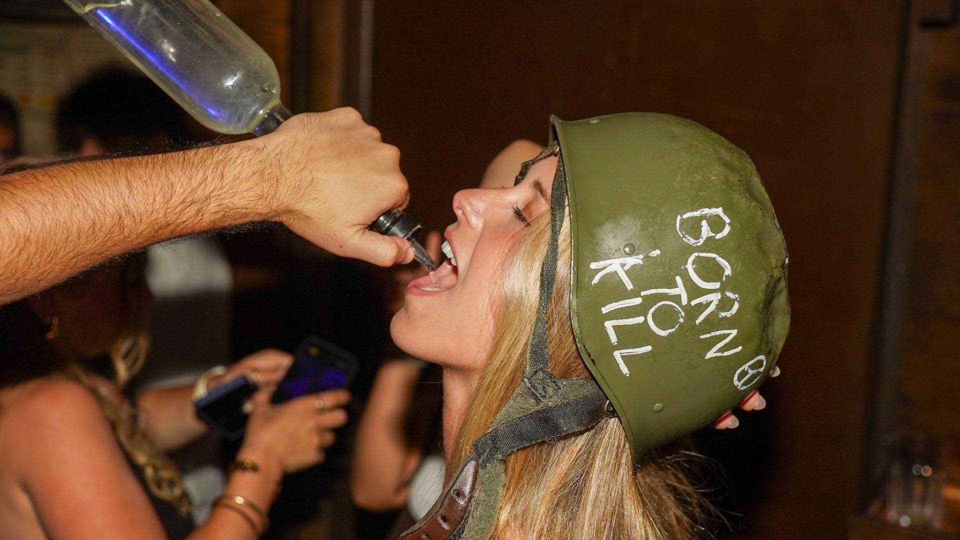 Nice Bar Crawl Orange party with an international crowd enjoying a vibrant nightlife experience in Nice